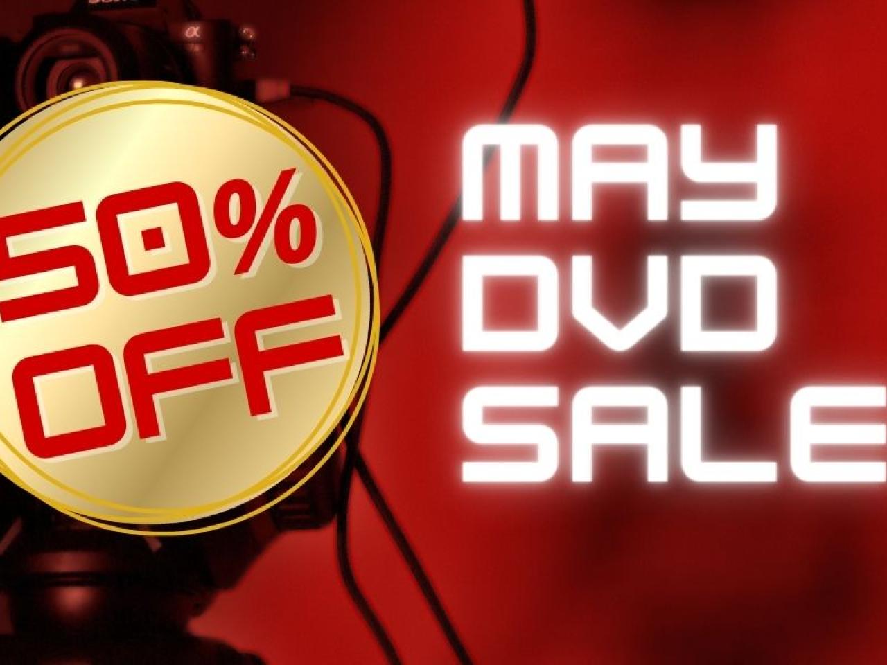 Gold circle with text in red 50% off next to white text that reads may dvd sale! over a red background with black blurred camera image