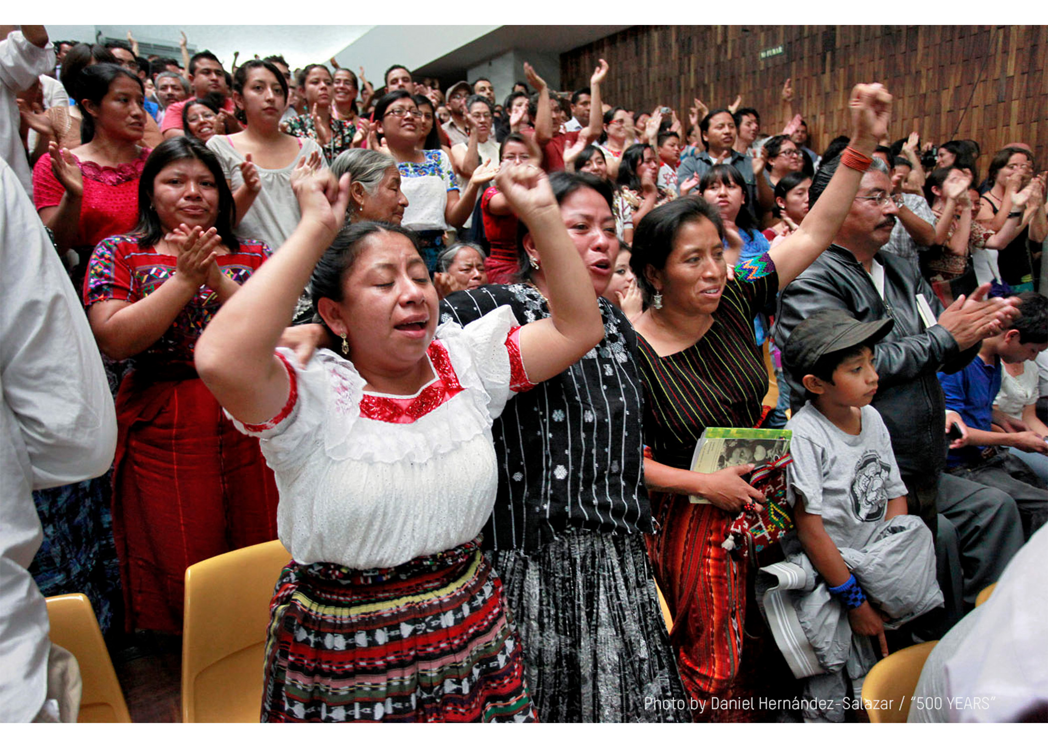 Crowd of people cheering