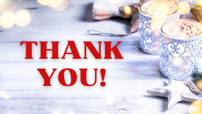 Thank you text over whitewashed wood background with white candles and star ornament