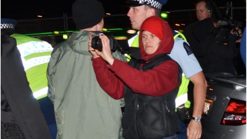 Briar Marsh filming at a protest.