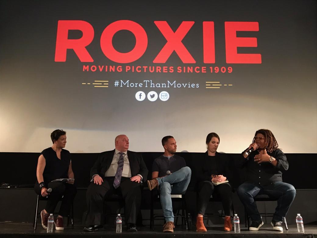 Filmmaker Christie Herring on a panel onstage at the Roxie.