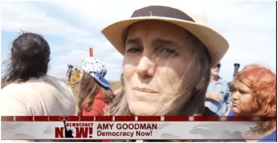Amy Goodman reporting in the field on Democracy Now.