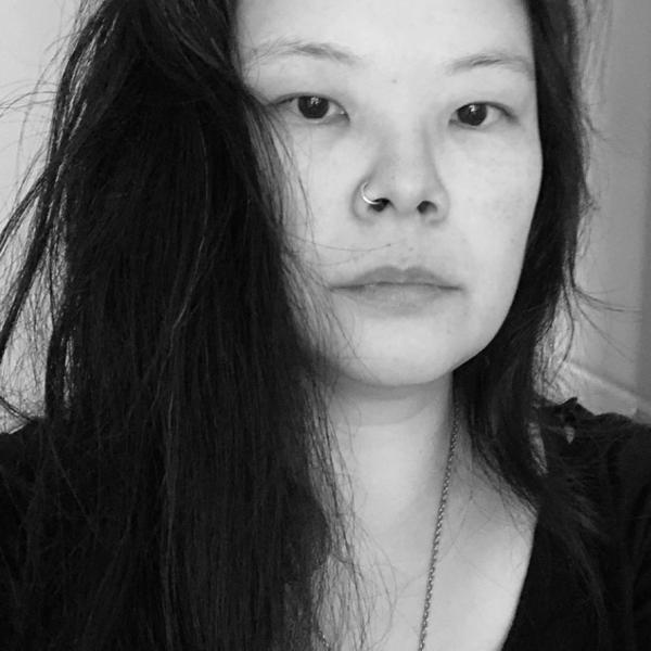 black and white photo of Asian woman with long black hair