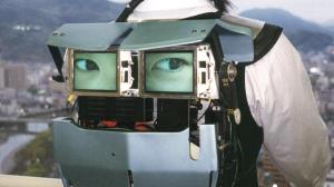 Eye of operator projected in the back of the Dis-Armor unit which is used for communication  