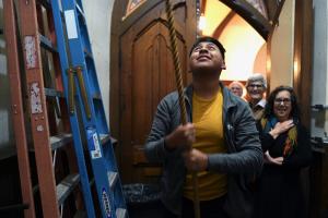 Lucio's son rings church bell