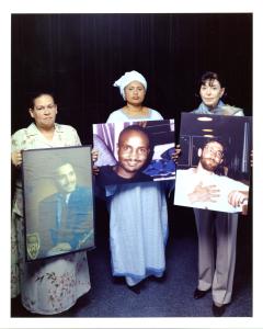 3 mothers holding pictures of their sons