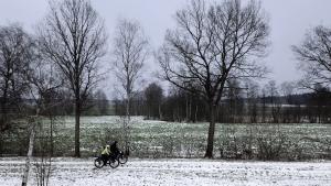 Mark and Carrie biking in Germany shooting "Dear Sirs"