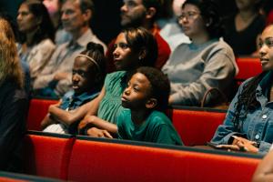 An audience watching a film