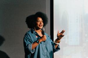 Black woman with microphone