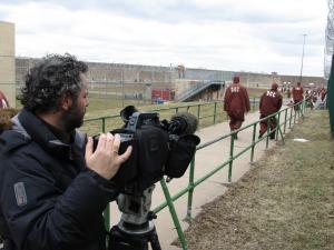 Cameraman David Sarasti shooting in prison yard.JPG