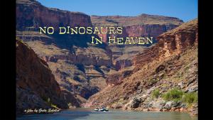 A still from the New Day film No Dinosaurs in Heaven. A large canyon with a strip of clear blue sky at the top. Down in the canyon is a group of people rafting. On top of the image white text reads the title of the film “No Dinosaurs in Heaven” A small blue strip on the bottom gives details about the film.