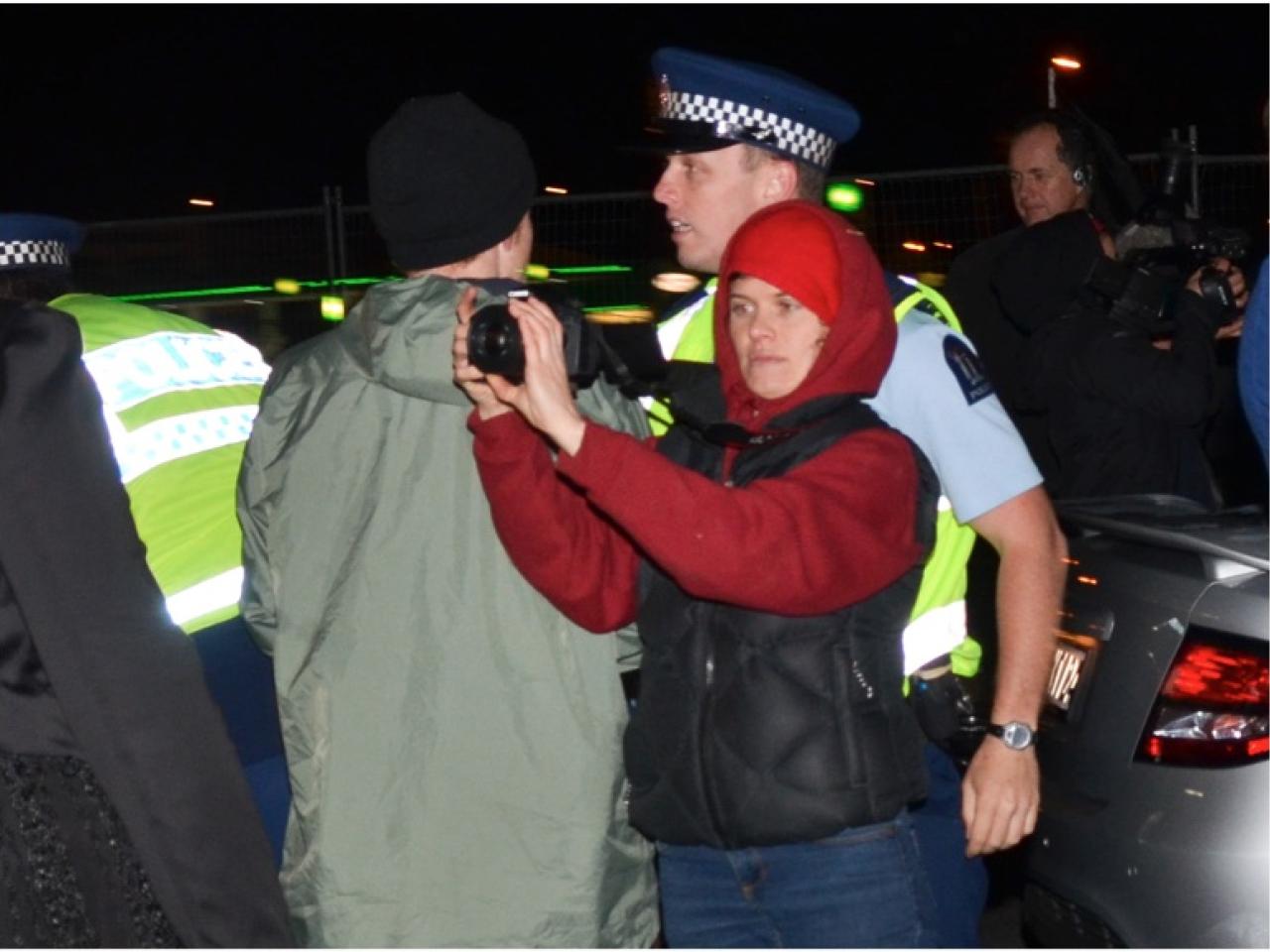 Briar Marsh filming at a protest.