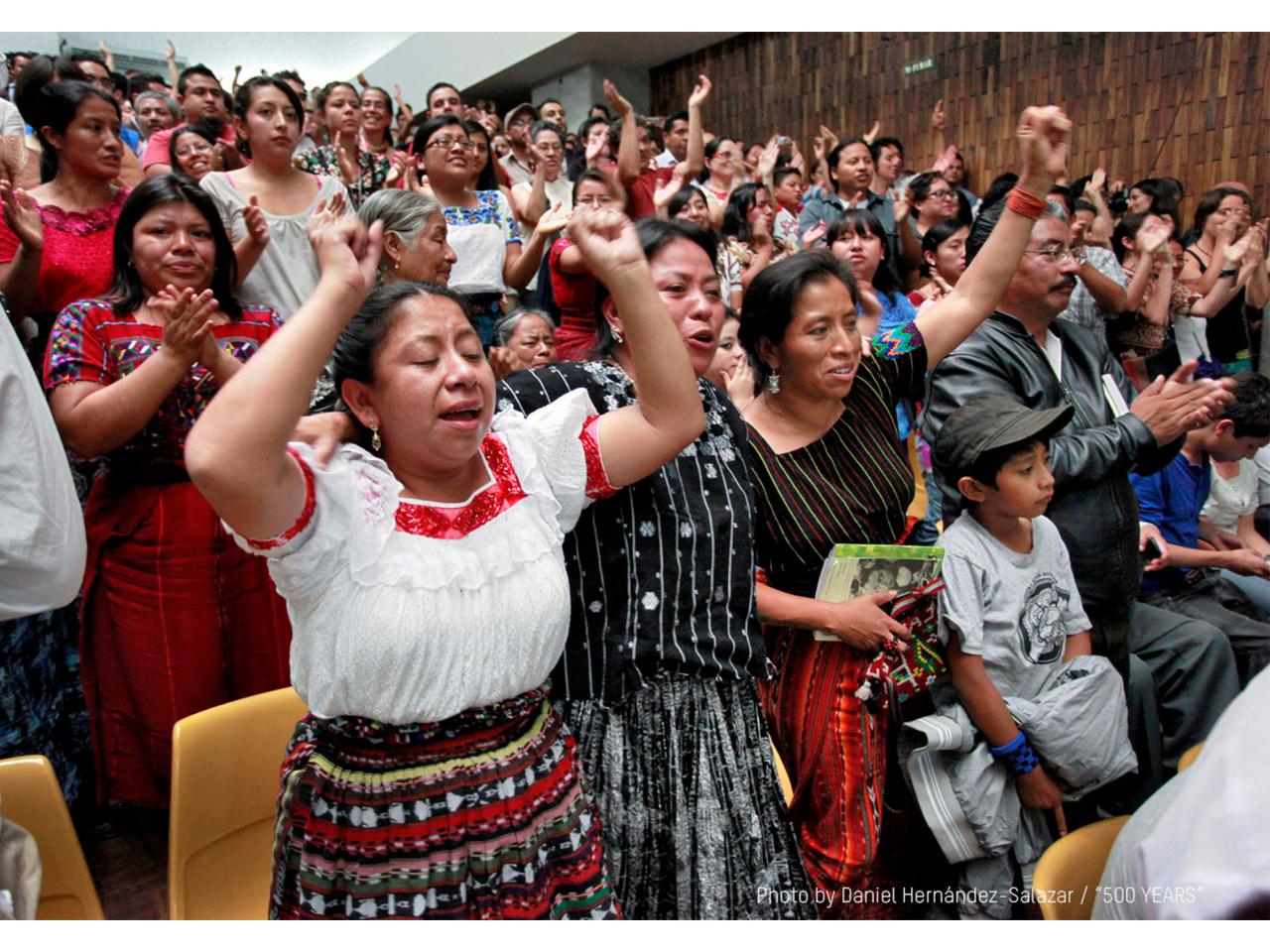 Crowd of people cheering